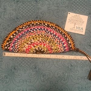 Multicolored semi circle woven clutch with zipper